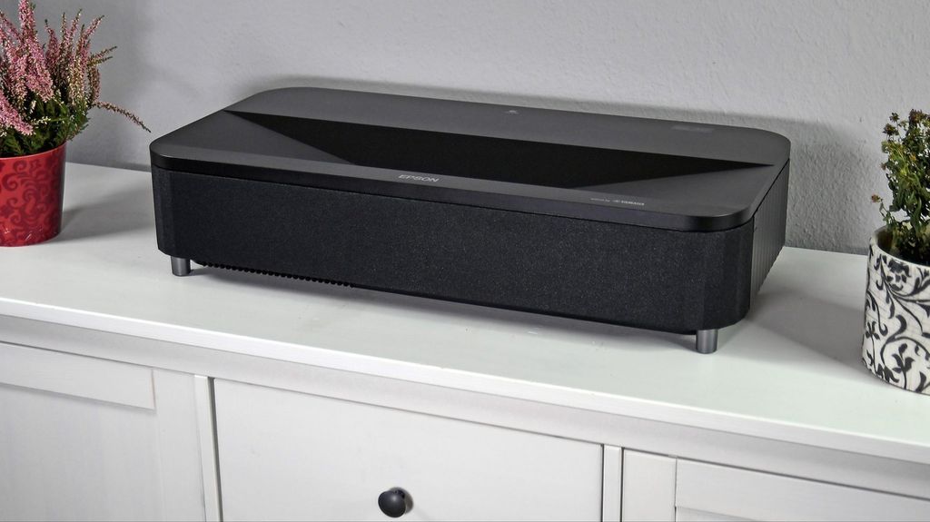 The Epson EH-LS970 is a new flagship ultra short throw projector from the Lifestudio series. It offers native 4K resolution, 4,000 lumens of brightness, Google TV, Bose-tuned audio and a screen size of up to 150 inches, even in daylight.